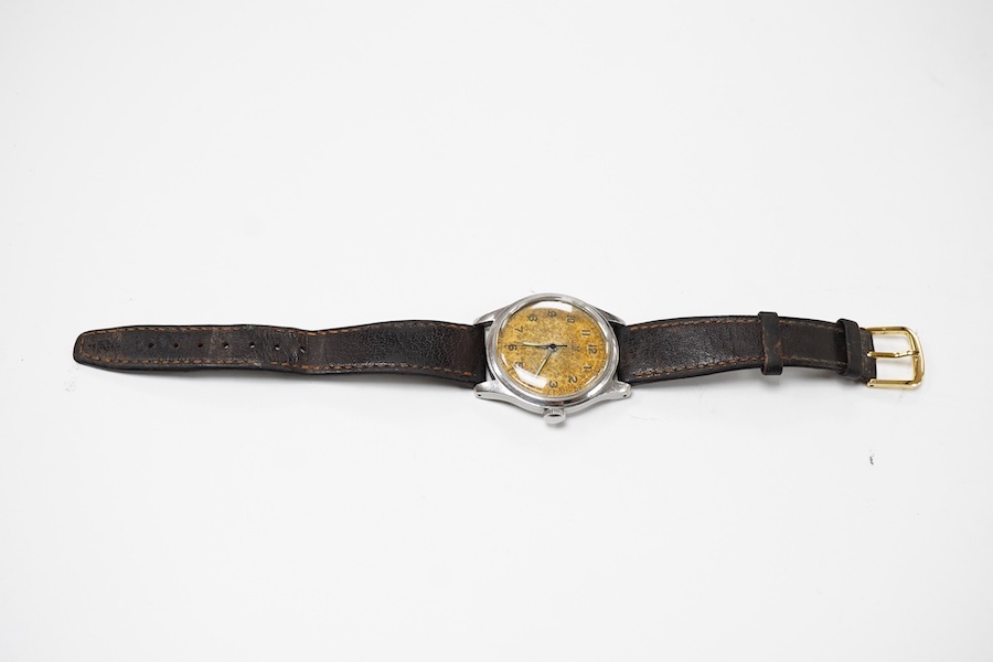 A gentleman's mid 1940's stainless steel Omega manual wind wrist watch, with Arabic dial, movement c.T2 SC PC, case diameter 35mm, on an associated leather strap, no box or papers.